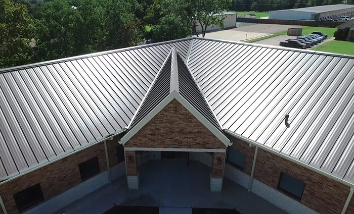 A beautiful metal roof installation is shown.